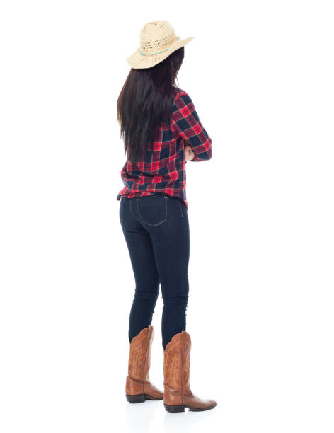 istock Beautiful young latino female standing with arms folded 1065482914