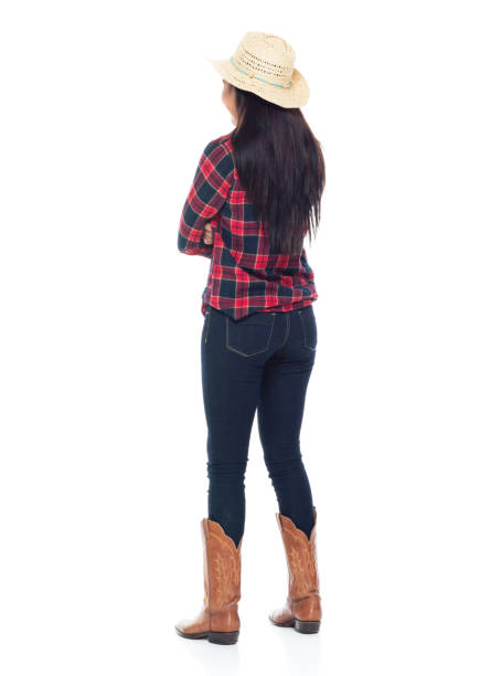 istock Beautiful young latino female standing with arms folded 1065482926
