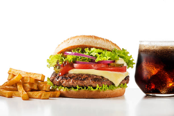 istock Burger with fried potatoes and cola drink 1065483726
