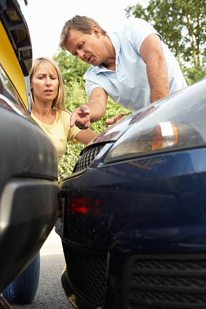 istock Man and woman having an argument after a traffic accident 106548685