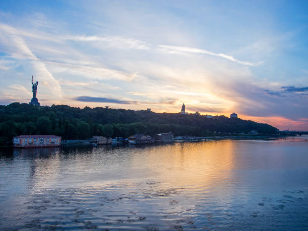 istock Beautiful sunset in the river. Kiev cityscape. 1065490024