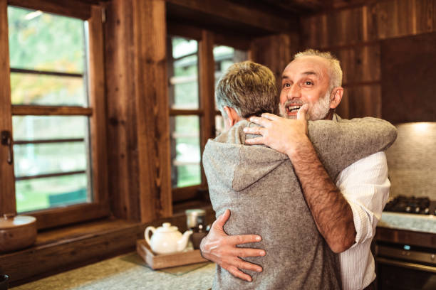 istock senior adult embracing at home 1065492184