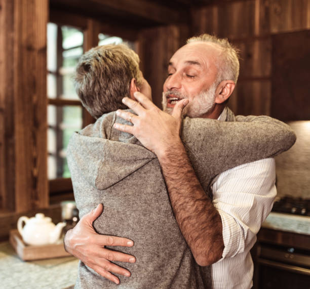 istock senior adult embracing at home 1065492300