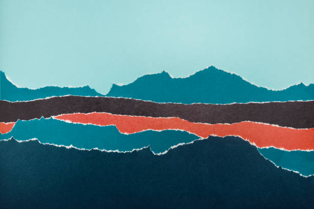 istock Layers of colored paper with torn edges. 1065494836