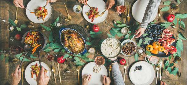 istock Traditional Christmas, New Year holiday celebration party dinner, wide composition 1065494886