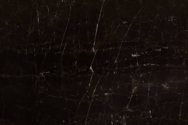 istock Dark brown marble background with cracks. Exclusive natural stone texture. 1065496090