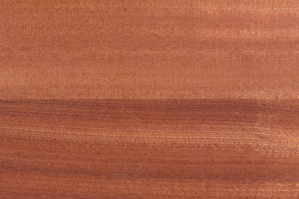 istock Natural red wood texture background on macro. 1065498202