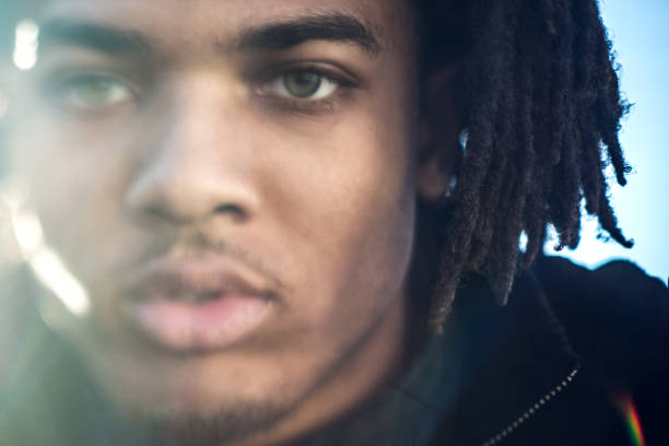 istock Soft Focus Portrait of Young Man With Dreadlocks 1065498538