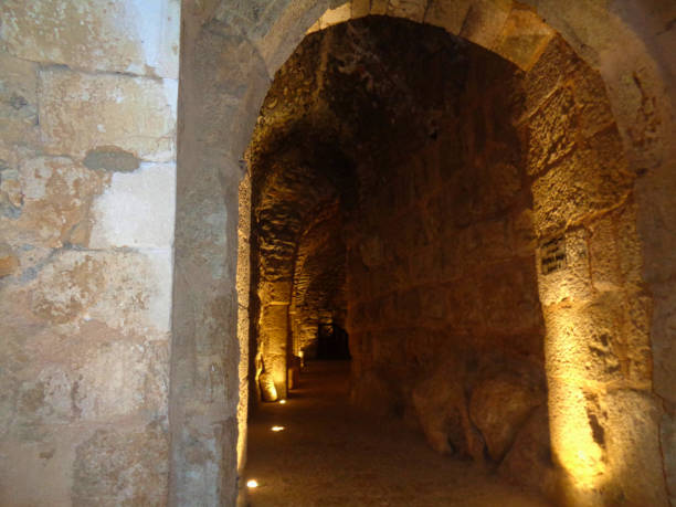 istock old catacomb way in a ruin 1065498672