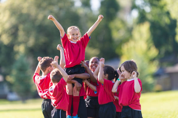 istock Kids' soccer team celebrates 1065504410