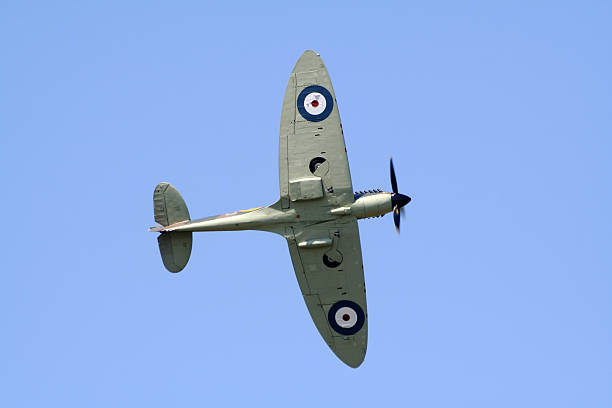 istock Underside of RAF Spitfire flying in the sky 106550716
