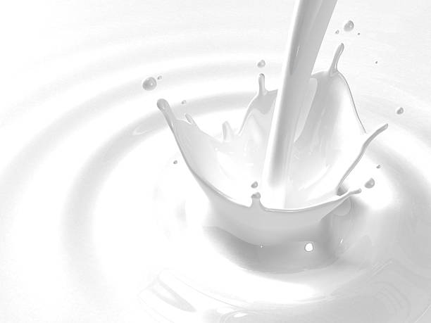istock White milk pouring and splashing with ripples  106550905