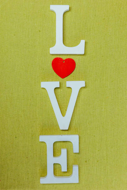 istock word love isolated on a green background 1065522512