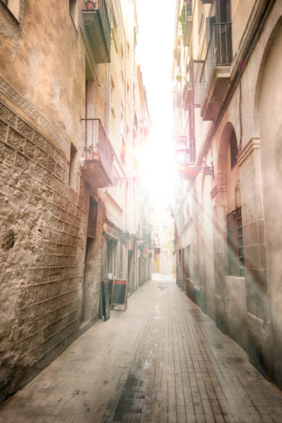 istock Sunrise over narrow street in Spain 1065523734