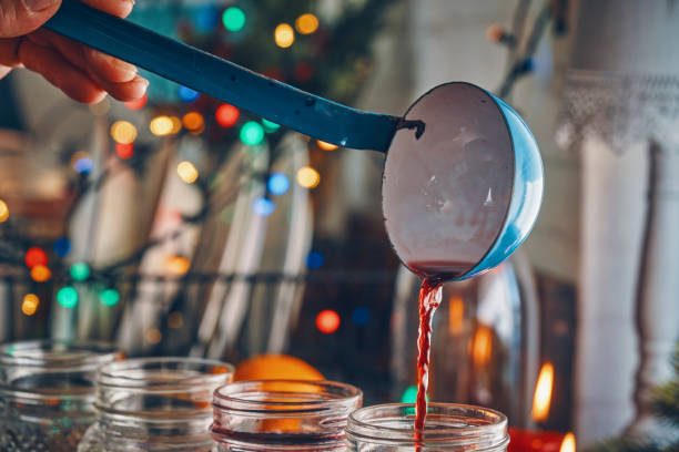 istock Preparing Mulled Wine with Orange, Cinnamon, Star Anise and Spices for Christmas 1065525578