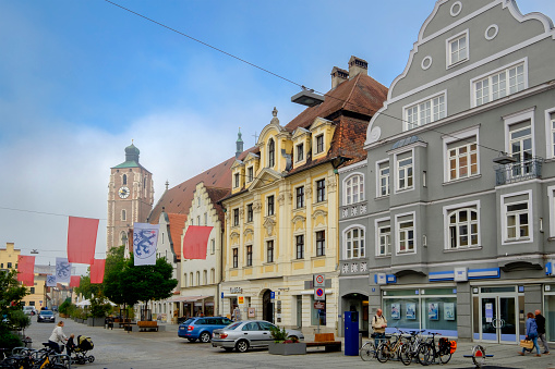 People strolling in Theresienstraße, in the old town of Ingolstadt, a city on the banks of the River Danube in the federal state of Bavaria.