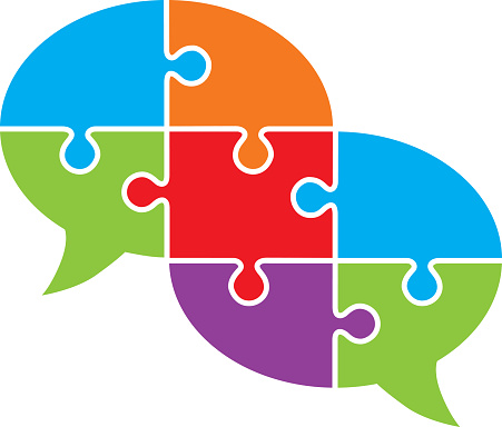 Vector illustration of two colorful connected puzzle pieces speech bubble.
