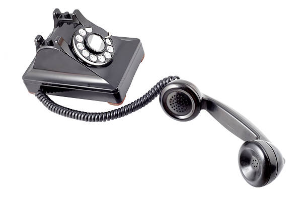 istock Vintage black rotary phone (with clipping path) 106553382