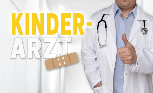 istock Kinderarzt (in german Pediatrician) concept and doctor with thumbs up 1065539246