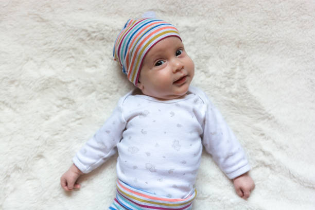 istock Little baby laying on a bed 1065545298
