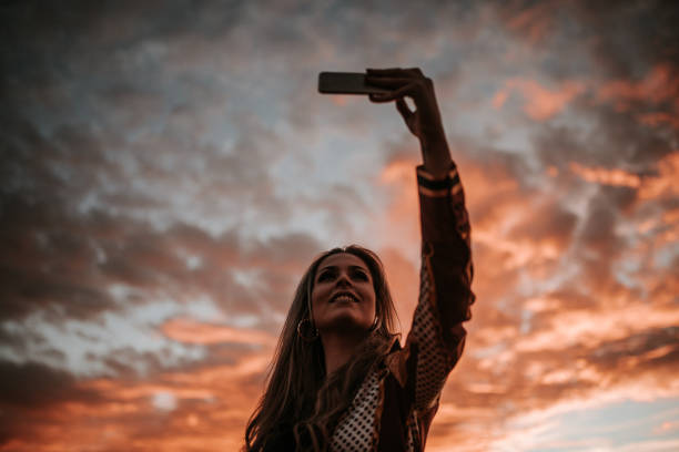 istock Young woman taking her selfie picture 1065548862