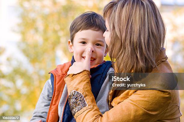 Playing In Autumne Park Stock Photo - Download Image Now - Activity, Adult, Beautiful People