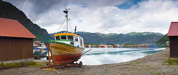 istock Fishing boat and mountains 106556238