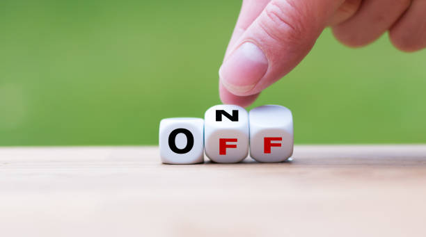 istock Hand turns a dice and changes the word 