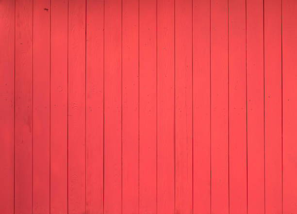 istock red wooden barn wall, red plank background 1065565680