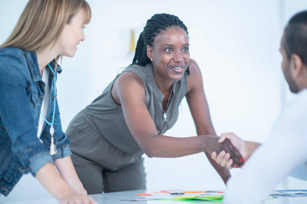 istock Meeting a new coworker 1065568664