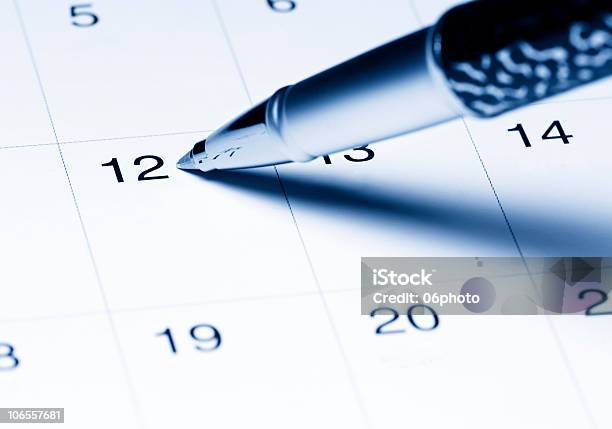 Closeup Of A Pen Writing On A Monthly Calendar Stock Photo - Download Image Now - Ballpoint Pen, Blank, Blue