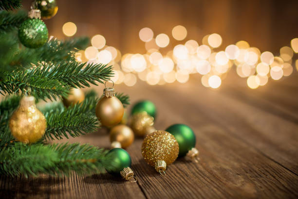 istock Christmas Tree decorated with christmas balls on rustic wood and sparkles light backgorund 1065578330