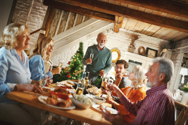 istock Family having Thanksgiving dinner. 1065579024