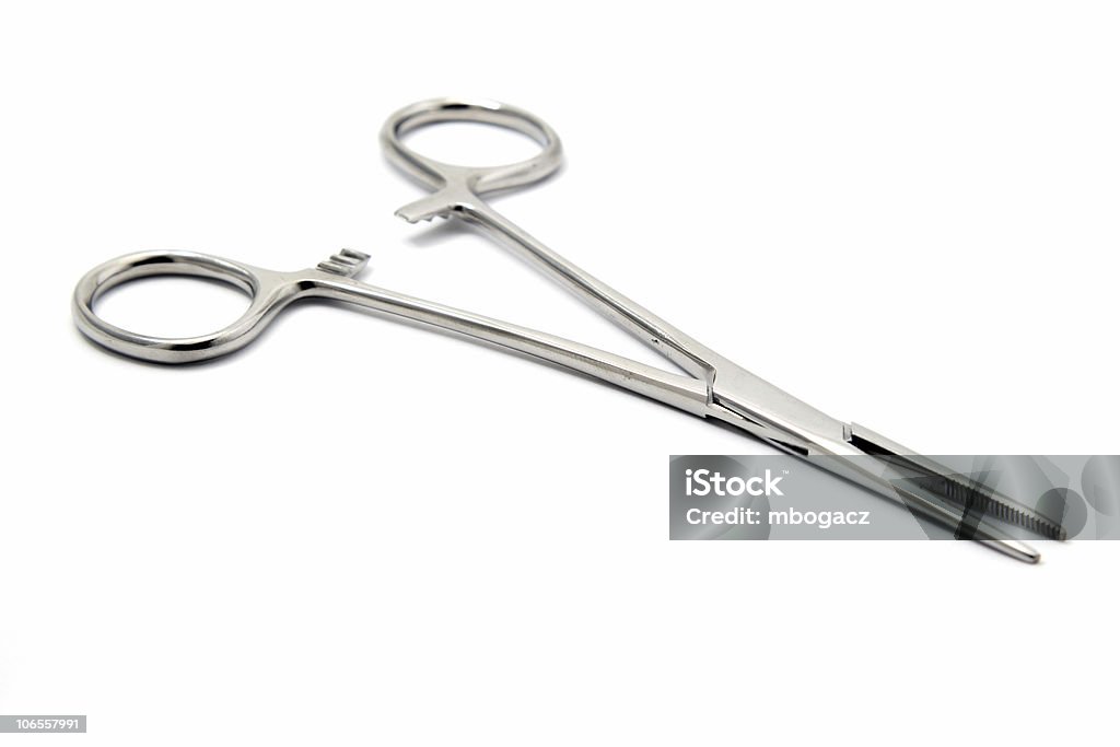 Medical Supplies, Alligator Clip Medical Supplies isolated on a white background. Alligator clip, suture driver. Hemostat Stock Photo