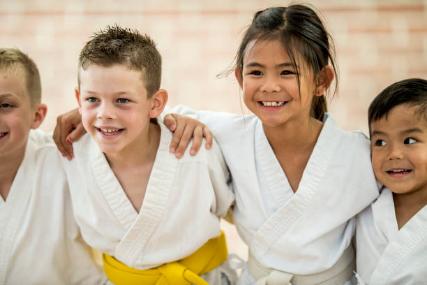 istock Children smiling during martial arts class 1065582448