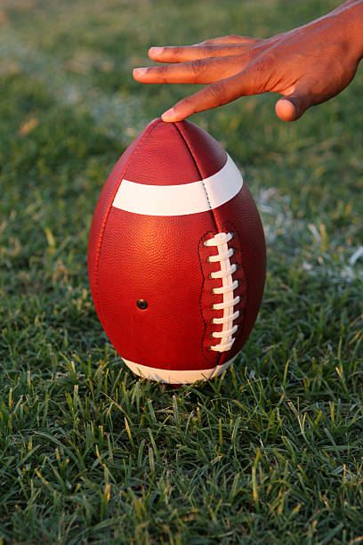 istock American Football held for kickoff 106558789