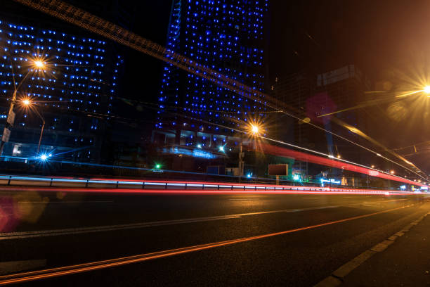 istock Kyiv night car trails on the modern building background, ukraine 1065590640