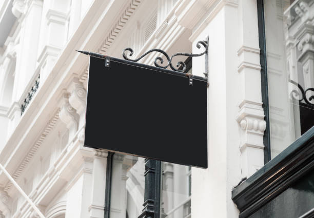 istock Classic style blank hanging company wall signboard mockup 1065596054
