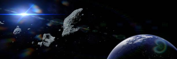 istock a swarm of gigantic asteroids moving towards planet Eart 1065599508