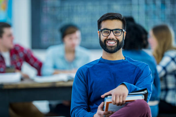 istock Male College Student Smiling 1065603708