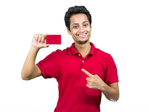 Man showing blank business card. Isolated on white background.