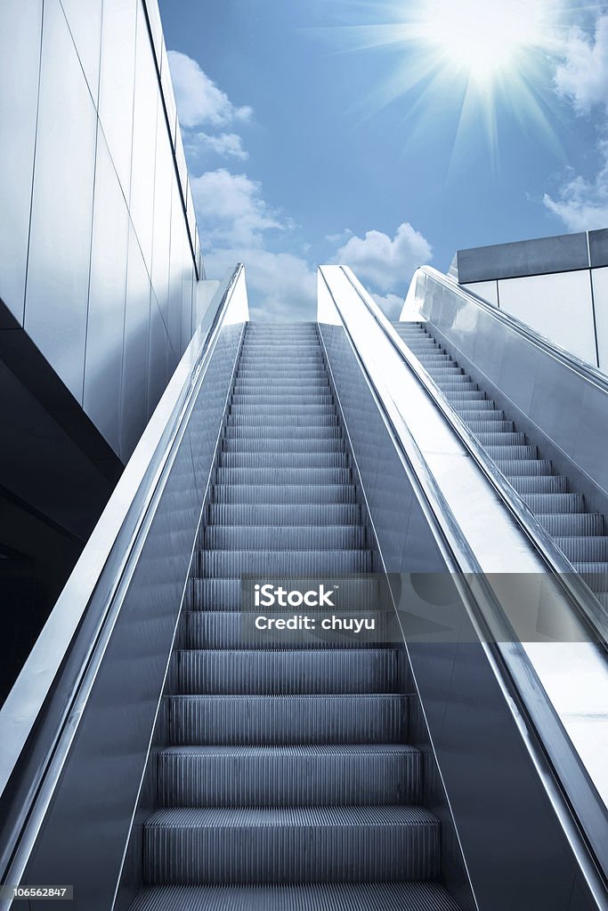 escalator escalator to the sky, urban fantasy landscape,abstract expression. Blue Stock Photo