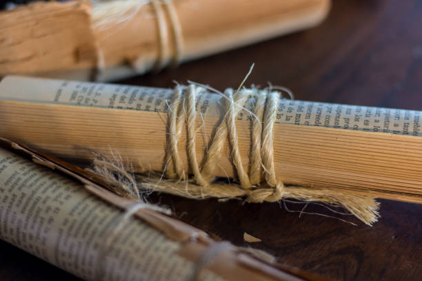 istock sheets of old books tied 1065637642