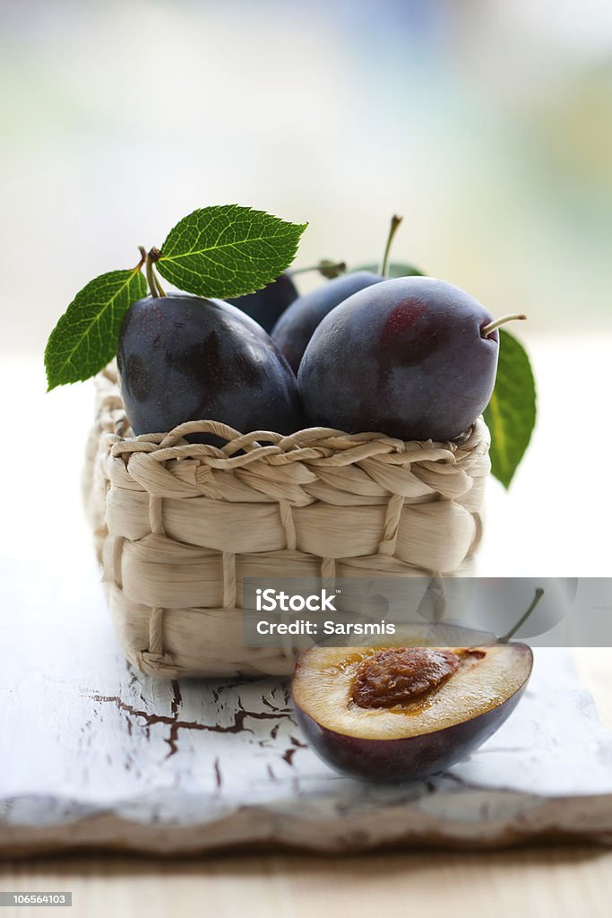 plums  Basket Stock Photo