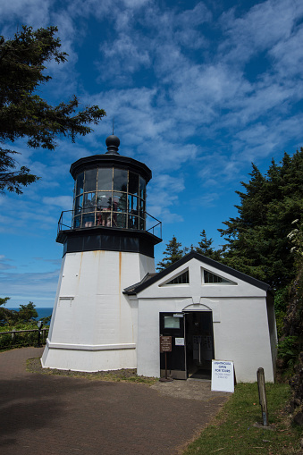 Cape Meares Lighthouse in Oregon on a sunny day