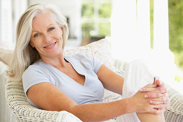 istock Senior Woman Sitting Outside 106564649