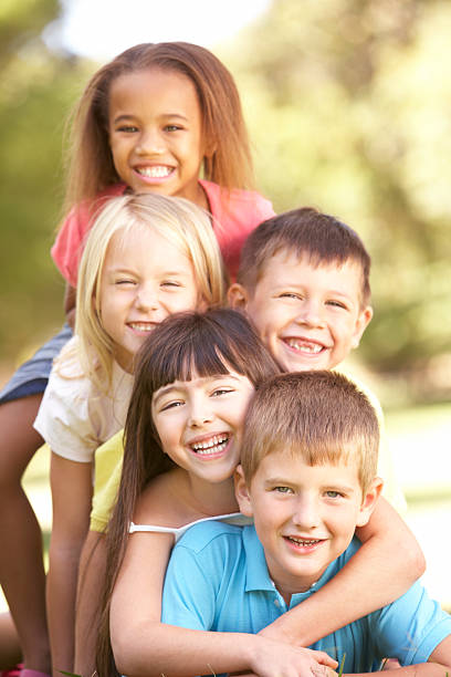 istock Children Piled Up In Park 106564691