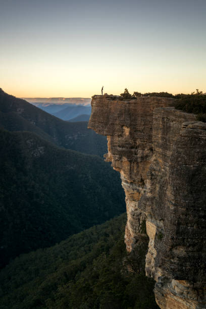 istock Happy girl on mountain peak 1065649082