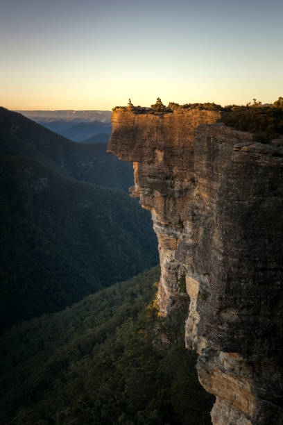 istock Happy girl on mountain peak 1065649092