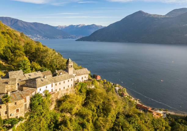 istock Medieval village on a mountain over a lake. 1065659526